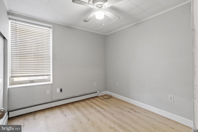 412 Market St, Trenton, NJ 08611 - empty room featuring a baseboard heating unit, ceiling fan, ornamental molding, and wood finished floors