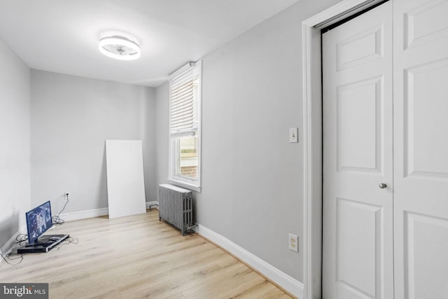 412 Market St, Trenton, NJ 08611 - interior space with baseboards, radiator heating unit, and wood finished floors
