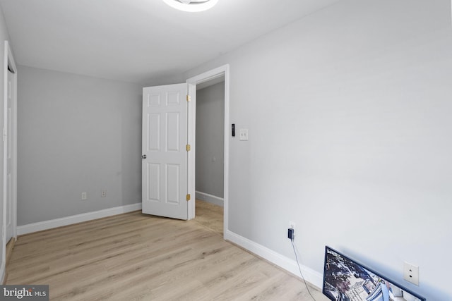 412 Market St, Trenton, NJ 08611 - unfurnished bedroom featuring wood finished floors and baseboards