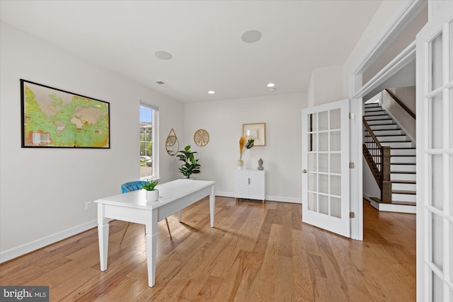 office with light wood-style flooring, baseboards, french doors, and recessed lighting
