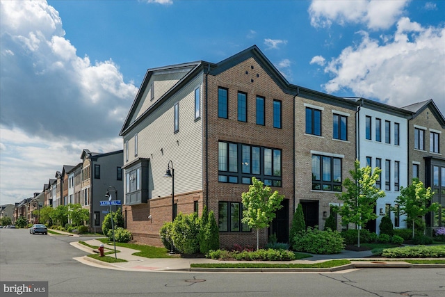 view of building exterior with a residential view