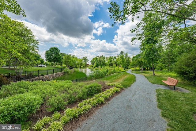 view of community featuring view of scattered trees