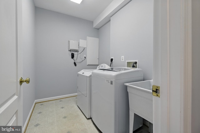 42827 Freedom St, Chantilly, VA 20152 - washroom featuring separate washer and dryer, baseboards, and light tile patterned floors