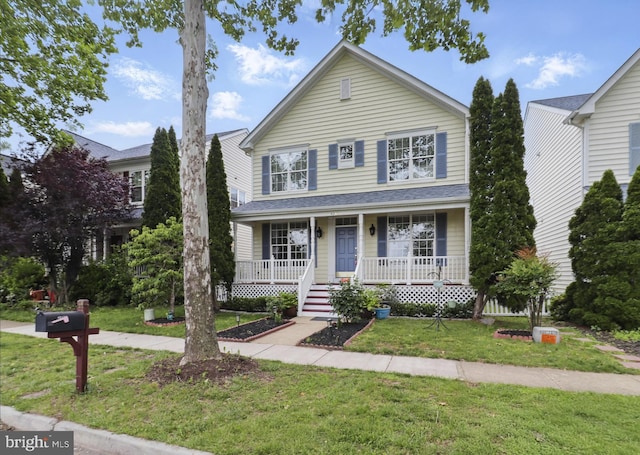 42827 Freedom St, Chantilly, VA 20152 - traditional home with covered porch and a front lawn