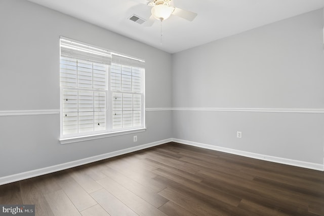 42827 Freedom St, Chantilly, VA 20152 - spare room with dark wood-style floors, plenty of natural light, ceiling fan, and baseboards