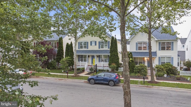 42827 Freedom St, Chantilly, VA 20152 - view of front facade featuring a porch and a shingled roof