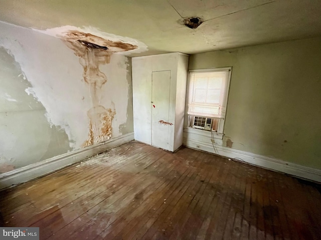 407 Carruthers St, Lexington, VA 24450 - spare room with hardwood / wood-style floors, cooling unit, and baseboards