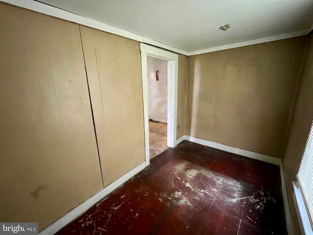 407 Carruthers St, Lexington, VA 24450 - unfurnished bedroom featuring baseboards and concrete flooring