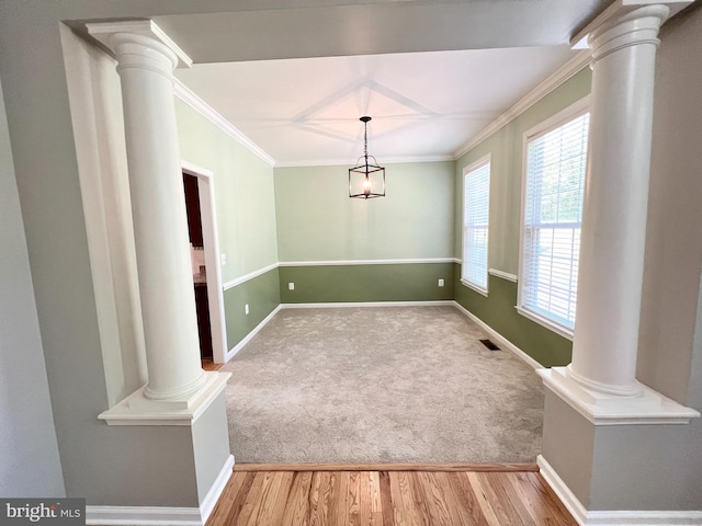 388 Wood Landing Rd, Fredericksburg, VA 22405 - unfurnished dining area featuring ornate columns, crown molding, and a wealth of natural light