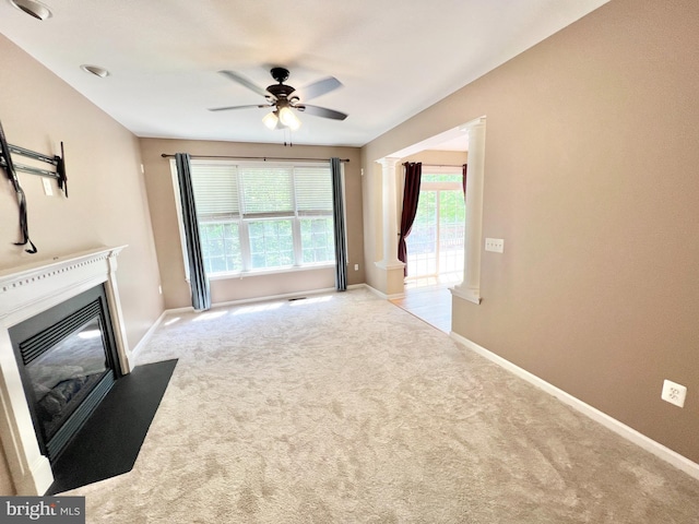 388 Wood Landing Rd, Fredericksburg, VA 22405 - unfurnished living room with a fireplace with flush hearth, carpet floors, baseboards, and a ceiling fan