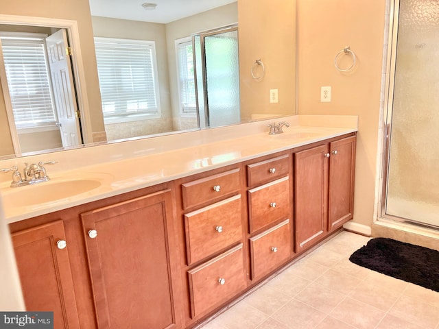 388 Wood Landing Rd, Fredericksburg, VA 22405 - full bath with double vanity, a sink, a stall shower, and tile patterned flooring