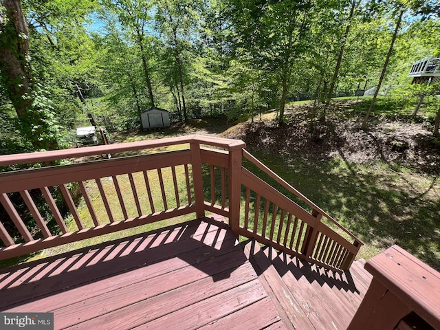 388 Wood Landing Rd, Fredericksburg, VA 22405 - wooden deck featuring an outdoor structure and a shed