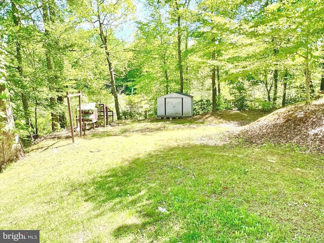 388 Wood Landing Rd, Fredericksburg, VA 22405 - view of yard featuring a storage unit and an outbuilding