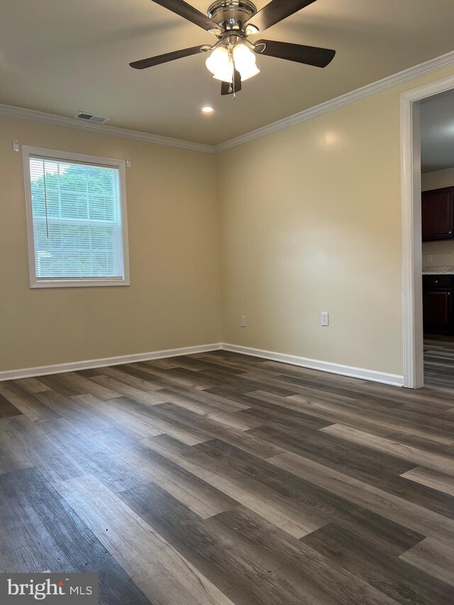 417 Bailey Ln, Salisbury, MD 21801 - empty room with crown molding, ceiling fan, dark wood-style flooring, and baseboards