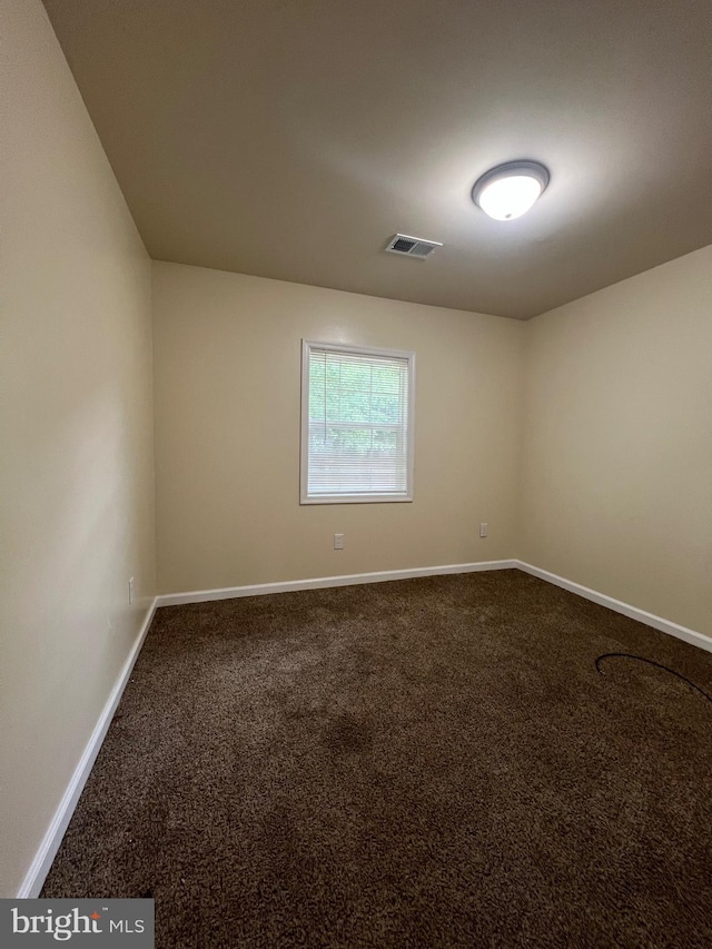 417 Bailey Ln, Salisbury, MD 21801 - unfurnished room featuring dark colored carpet and baseboards