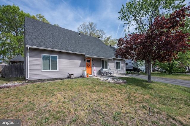 34 Pittman Ln, Sicklerville, NJ 08081 - view of front of property with roof with shingles, fence, and a front yard