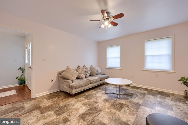 771 W Ridge Rd, Elizabethtown, PA 17022 - living area with baseboards, a ceiling fan, and stone finish flooring