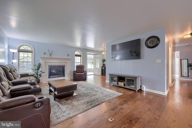 771 W Ridge Rd, Elizabethtown, PA 17022 - living area featuring baseboards, hardwood / wood-style flooring, and a tile fireplace