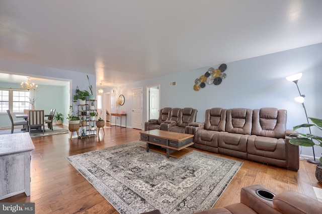 771 W Ridge Rd, Elizabethtown, PA 17022 - living room with visible vents, wood finished floors, and a chandelier