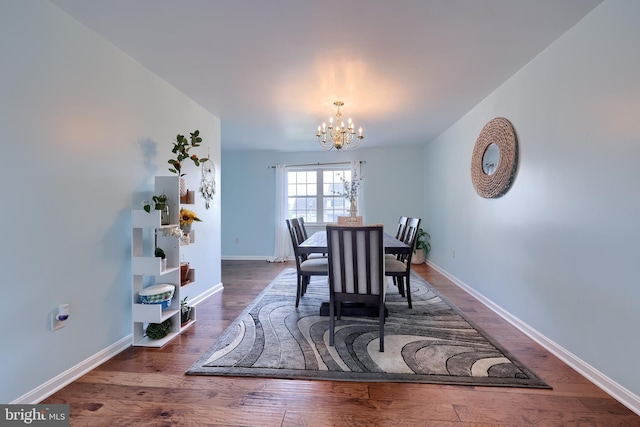 771 W Ridge Rd, Elizabethtown, PA 17022 - dining space with baseboards, a notable chandelier, and wood finished floors
