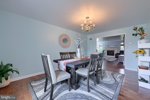 771 W Ridge Rd, Elizabethtown, PA 17022 - dining space with baseboards, wood finished floors, a notable chandelier, and visible vents