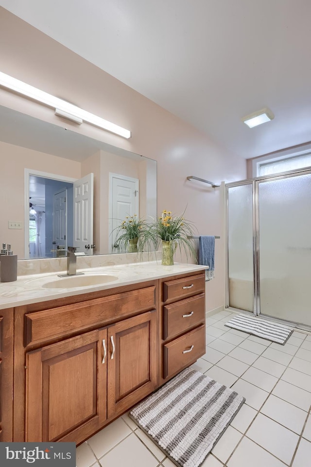 771 W Ridge Rd, Elizabethtown, PA 17022 - bathroom featuring a stall shower, tile patterned flooring, and vanity