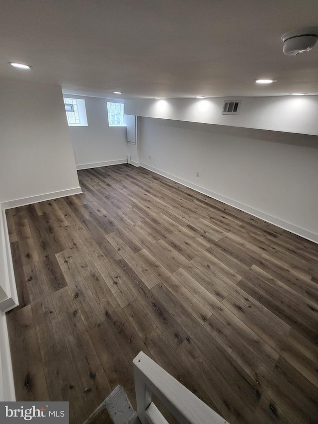 6232 N 10th St, Philadelphia, PA 19141 - basement with baseboards, dark wood-type flooring, and visible vents