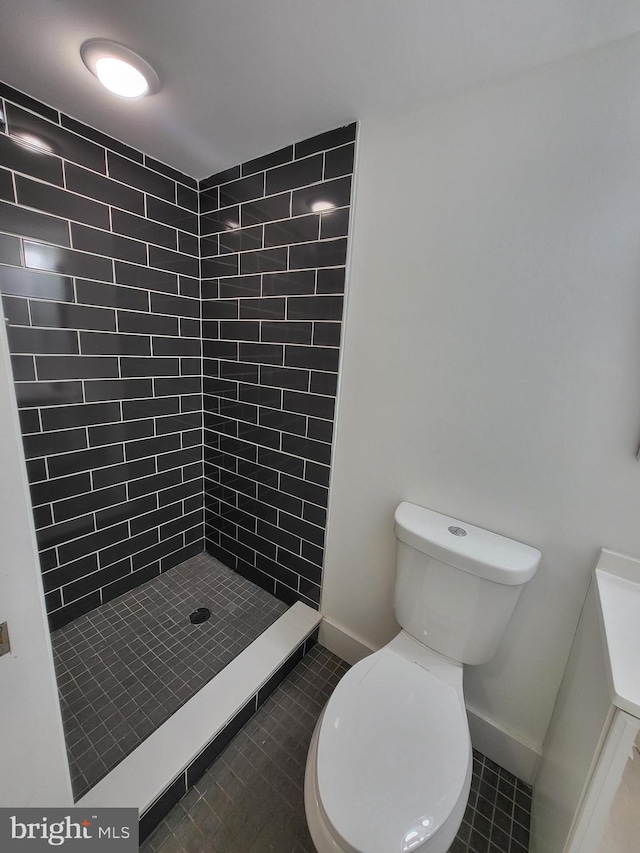 6232 N 10th St, Philadelphia, PA 19141 - full bath with baseboards, toilet, tile patterned floors, and a stall shower
