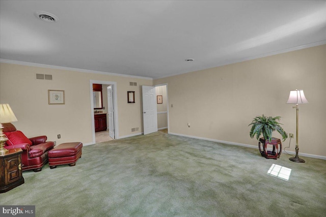 living area featuring carpet flooring, crown molding, visible vents, and baseboards
