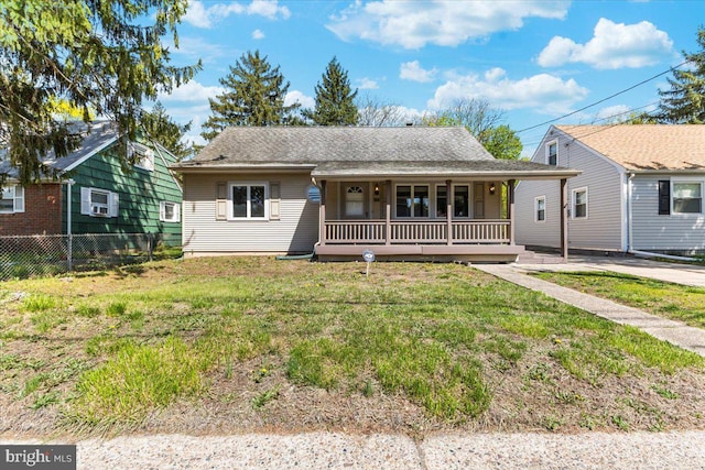 500 Klockner Rd, Hamilton, NJ 08619 - bungalow featuring fence, roof with shingles, covered porch, and a front lawn