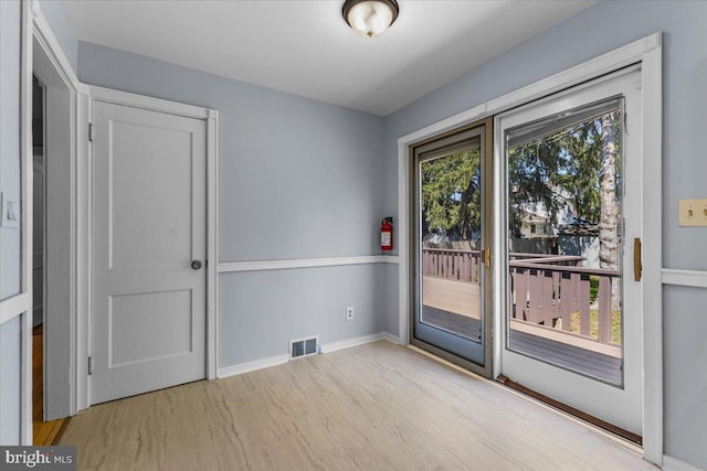 500 Klockner Rd, Hamilton, NJ 08619 - doorway featuring wood finished floors, visible vents, and baseboards