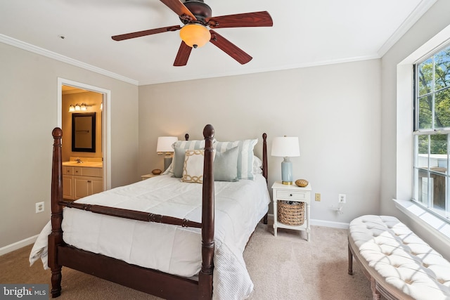bedroom with light colored carpet, ensuite bathroom, baseboards, ornamental molding, and a ceiling fan