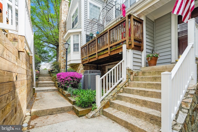 doorway to property with central AC