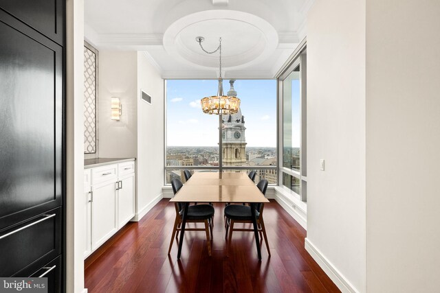 1414 S Penn Sq Unit 34B, Philadelphia, PA 19102 - dining area featuring an inviting chandelier, visible vents, crown molding, and dark wood-style floors