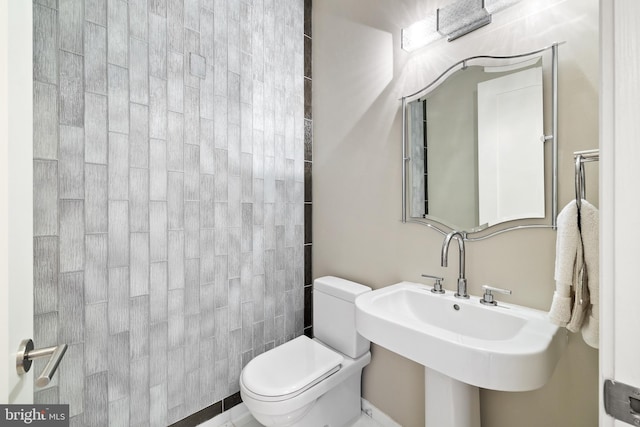 1414 S Penn Sq Unit 34B, Philadelphia, PA 19102 - bathroom featuring toilet and a sink