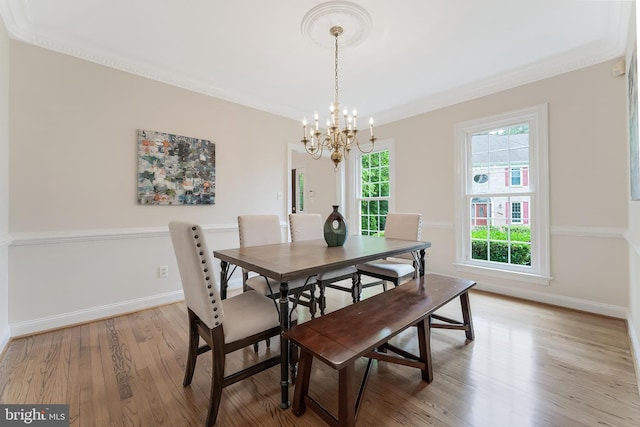 12600 Tolman Rd, Fairfax, VA 22033 - dining space featuring a chandelier, light wood-style flooring, baseboards, and crown molding