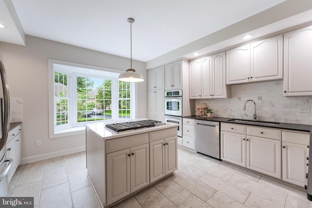 12600 Tolman Rd, Fairfax, VA 22033 - kitchen featuring stainless steel appliances, a sink, tasteful backsplash, recessed lighting, and baseboards