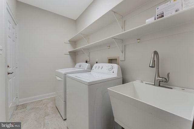 12600 Tolman Rd, Fairfax, VA 22033 - washroom featuring washing machine and dryer and baseboards