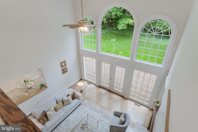 12600 Tolman Rd, Fairfax, VA 22033 - living area featuring plenty of natural light, ceiling fan, baseboards, and wood finished floors