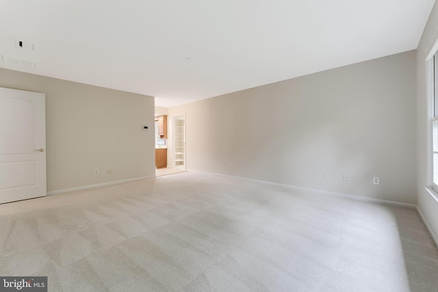 12600 Tolman Rd, Fairfax, VA 22033 - unfurnished room featuring light colored carpet and baseboards