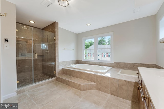 12600 Tolman Rd, Fairfax, VA 22033 - bathroom featuring tile patterned flooring, a garden tub, a stall shower, recessed lighting, and vanity