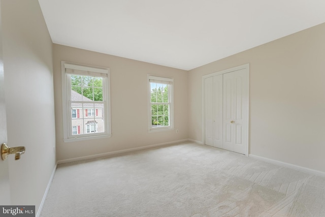 12600 Tolman Rd, Fairfax, VA 22033 - unfurnished bedroom with carpet flooring, baseboards, and a closet