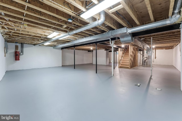 12600 Tolman Rd, Fairfax, VA 22033 - below grade area featuring stairway, a central vacuum unit, and heating unit