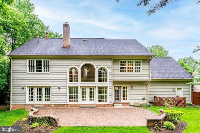 12600 Tolman Rd, Fairfax, VA 22033 - rear view of property with french doors, a chimney, and a patio area
