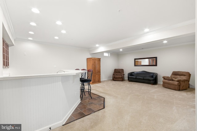 interior space with crown molding, carpet flooring, baseboards, and recessed lighting