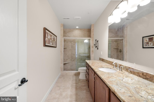 full bath featuring visible vents, a shower stall, vanity, tile patterned floors, and toilet