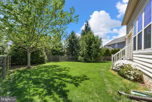 view of yard featuring a fenced backyard