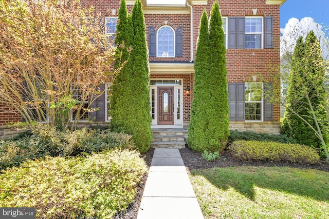 view of front facade with brick siding