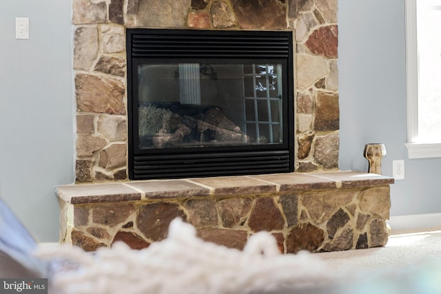 interior details with a fireplace