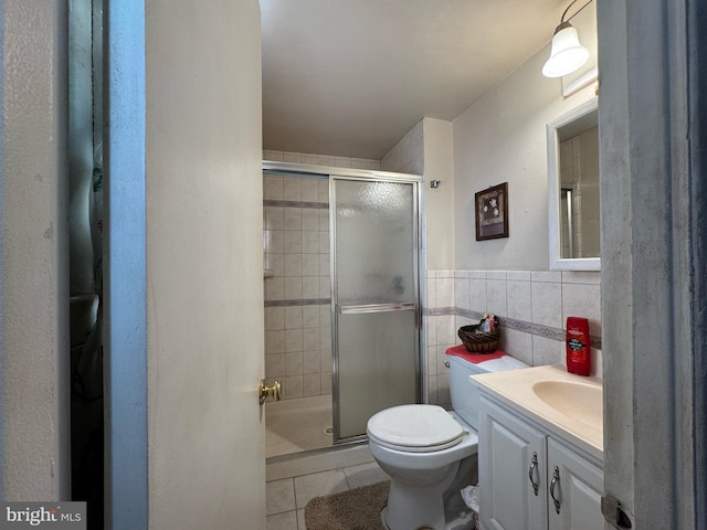 11 Riverview Pl, Willingboro, NJ 08046 - full bathroom with tile patterned floors, vanity, toilet, a stall shower, and tile walls